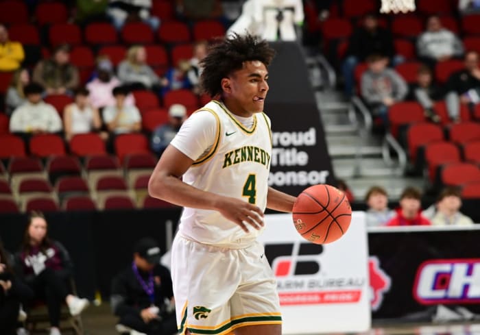 CR Kennedy's Cyrus Courtney dribbles up the court against Valley during the Class 4A state championship game at Wells Fargo Arena in Des Moines on Friday. (Photo by Ryan Timmerman)